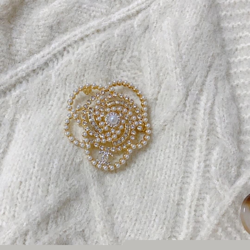Ch*el brooches